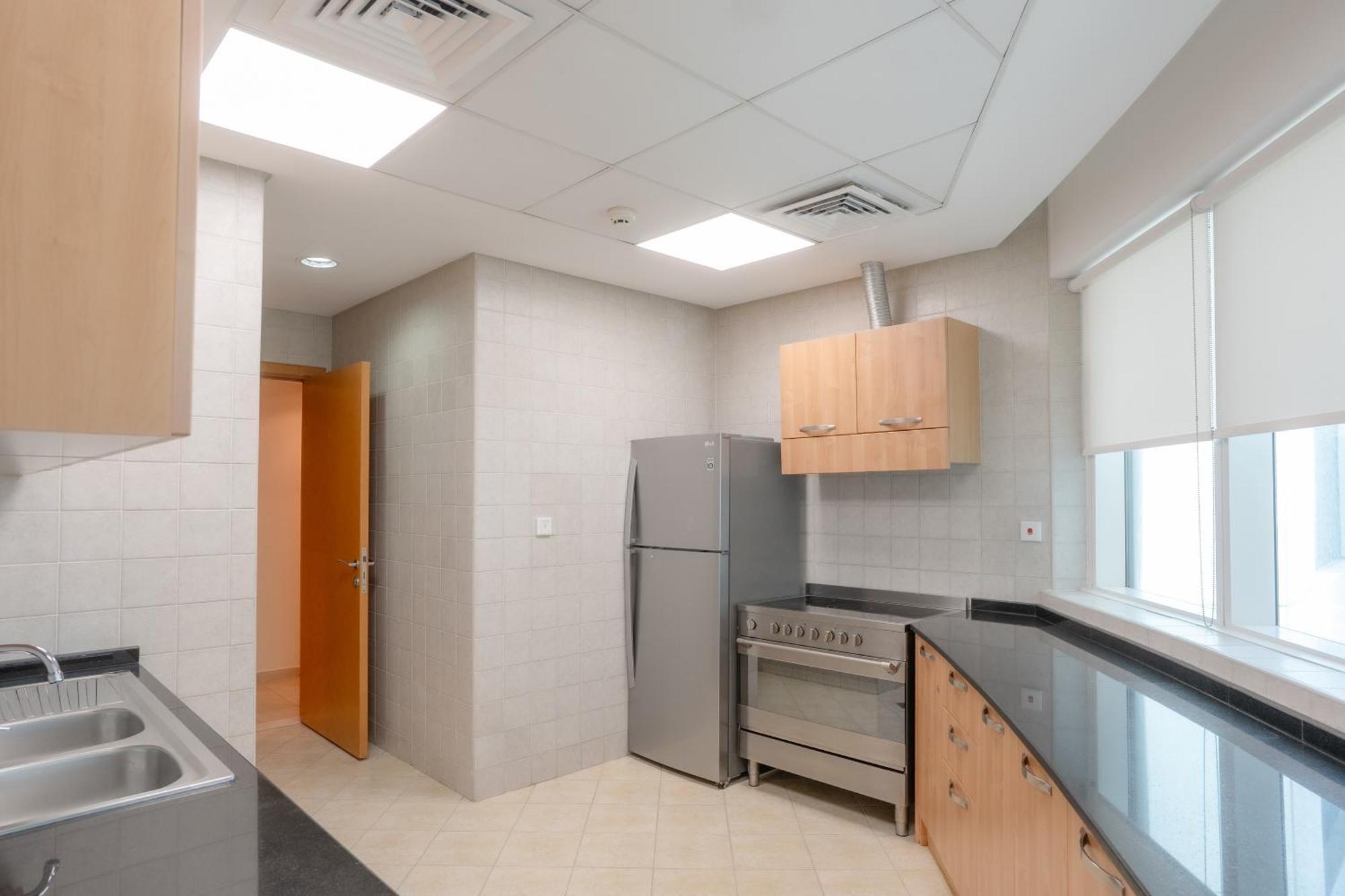 Tamani Marina Hotel & Apartments Dubai Exterior photo A typical kitchen in a residential hall
