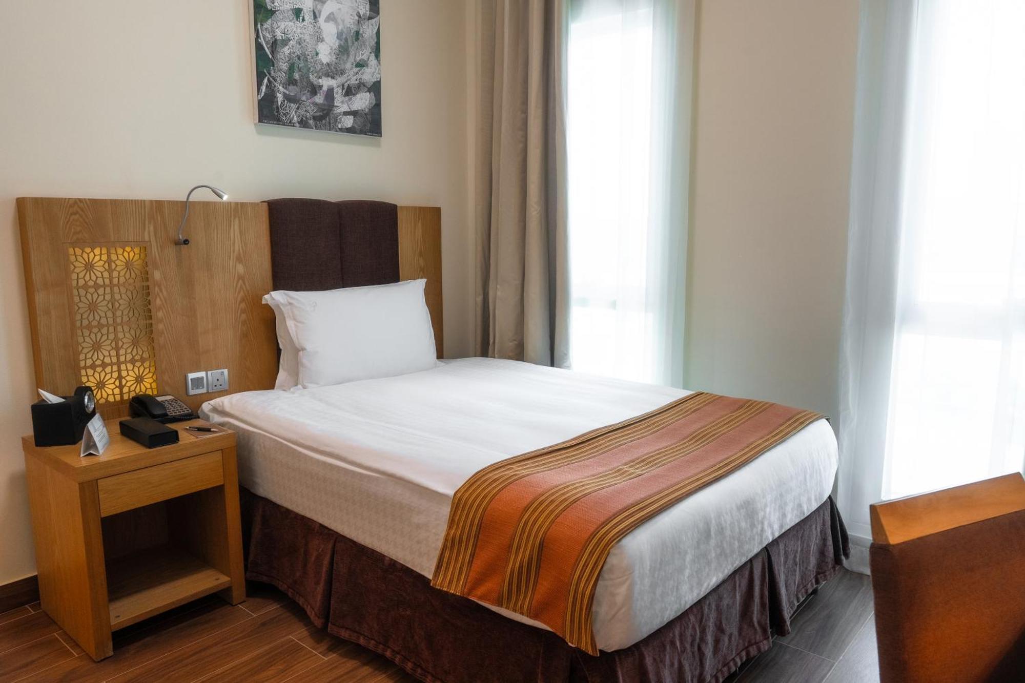 Tamani Marina Hotel & Apartments Dubai Exterior photo A single bed