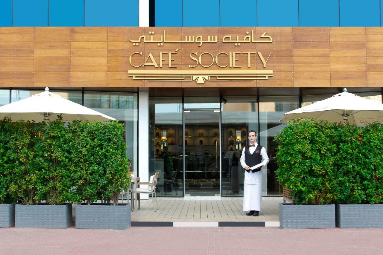 Tamani Marina Hotel & Apartments Dubai Exterior photo Café Society